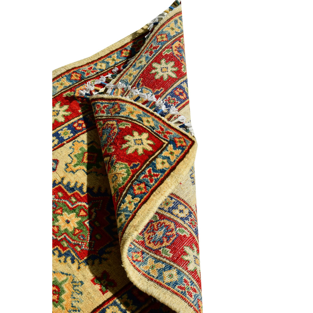 Handmade Afghan Aqcha Wool Rug 2.5x10 ft draped to show wool flexibility and soft texture