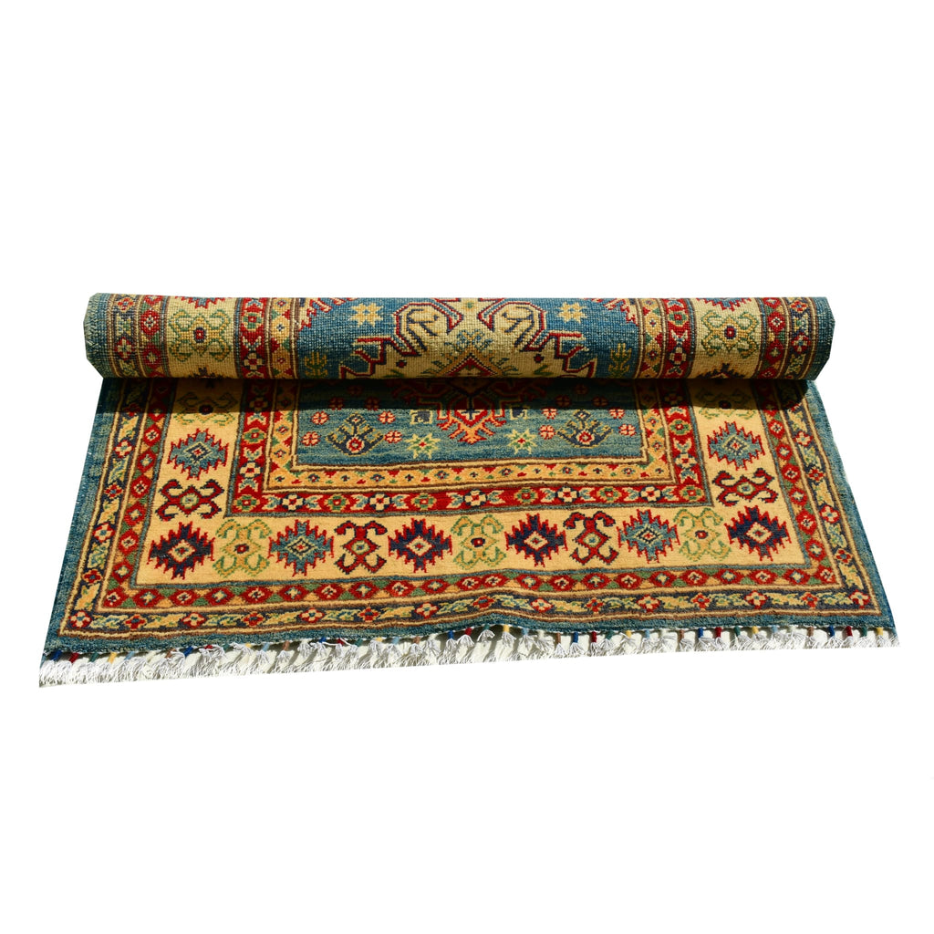 Handmade Afghan Aqcha Wool Rug 4x5 ft rolled view emphasizing soft pile and dense wool weave