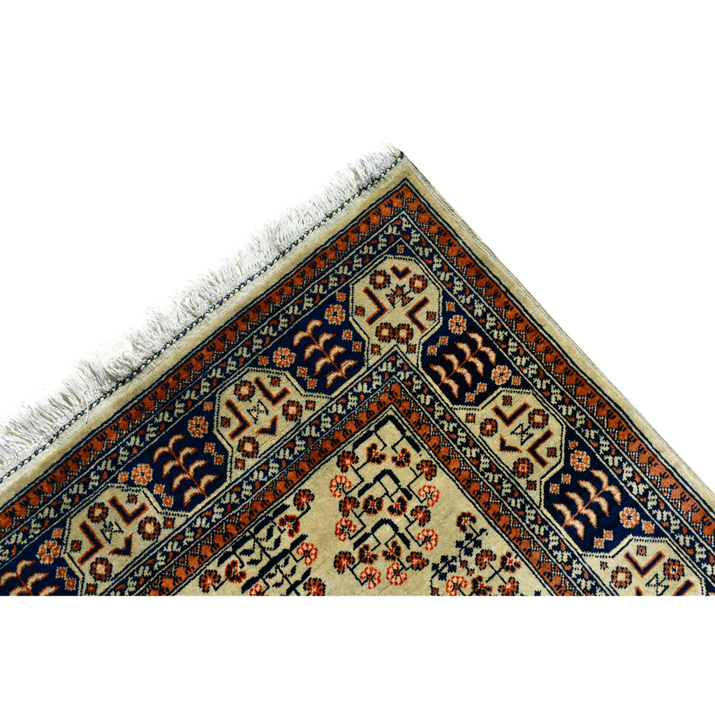 Handmade Afghan Aqcha Wool Rug 5x7 ft corner detail showing indigo border and madder red contrast