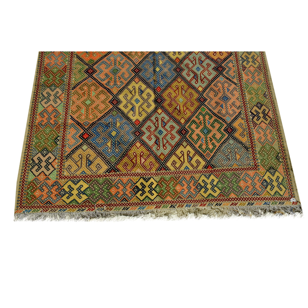 Handmade Afghan Aqcha Wool Rug 6x10 ft lower section showing intricate pattern and hand tied fringe