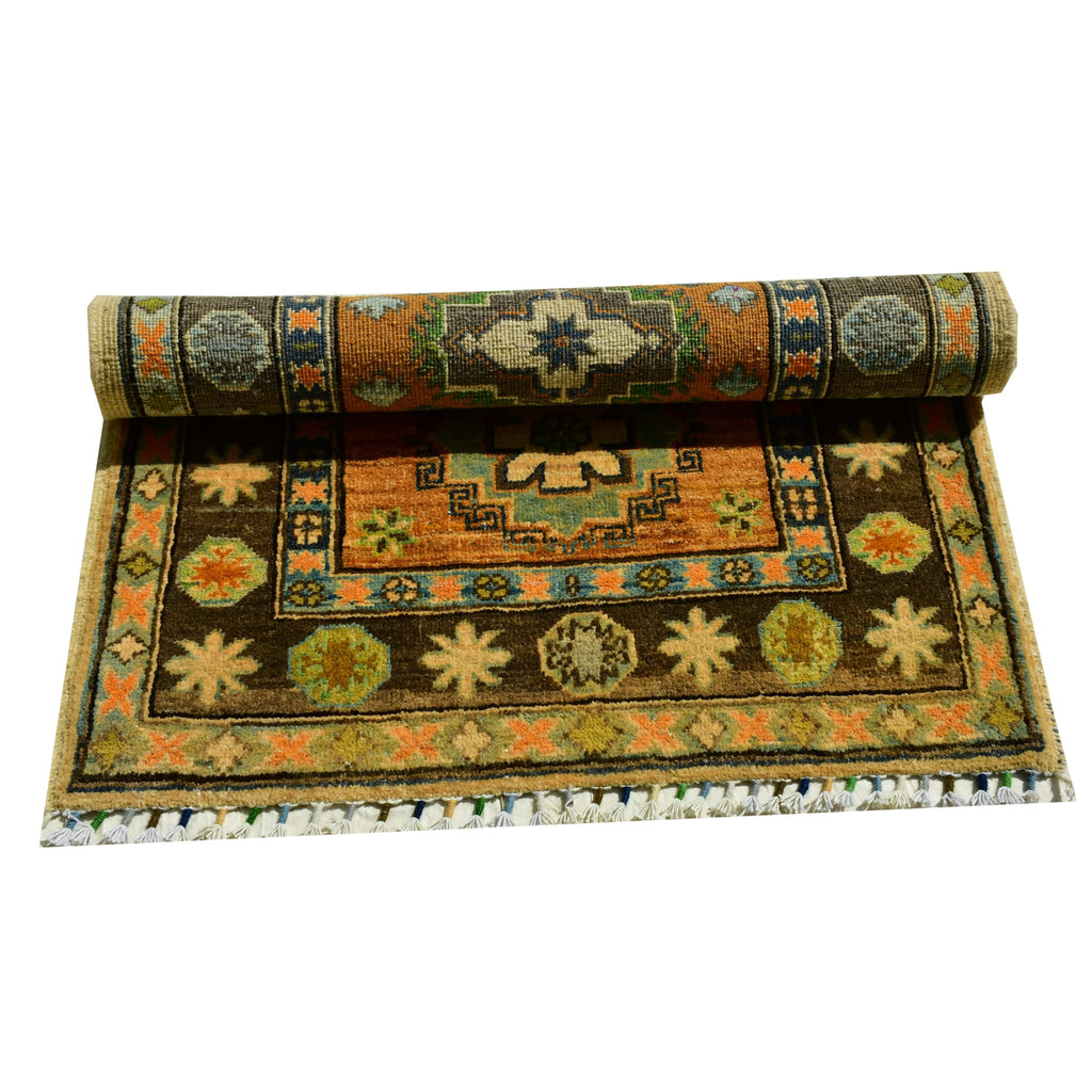 Handmade Afghan Aqcha Wool Rug 3x4 ft partially rolled to display edge finish and pattern continuity