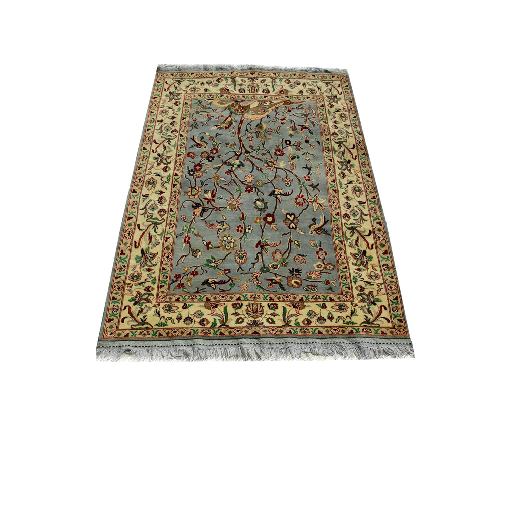 Handmade Afghan Aqcha Wool Rug 5x8 ft angled side view highlighting the ivory floral border