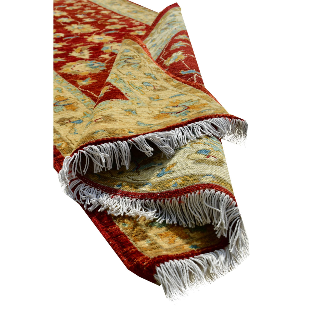 Handmade Afghan Aqcha Wool Rug 3x10 ft partially rolled view showing wool pile thickness
