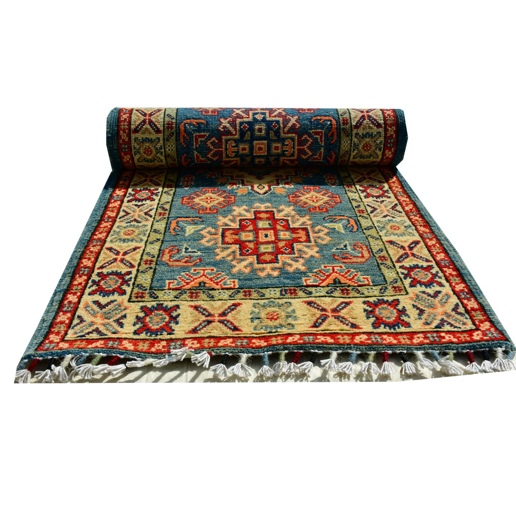 Handmade Afghan Aqcha Wool Rug 2x6 ft fully rolled view highlighting fringe tassels and border