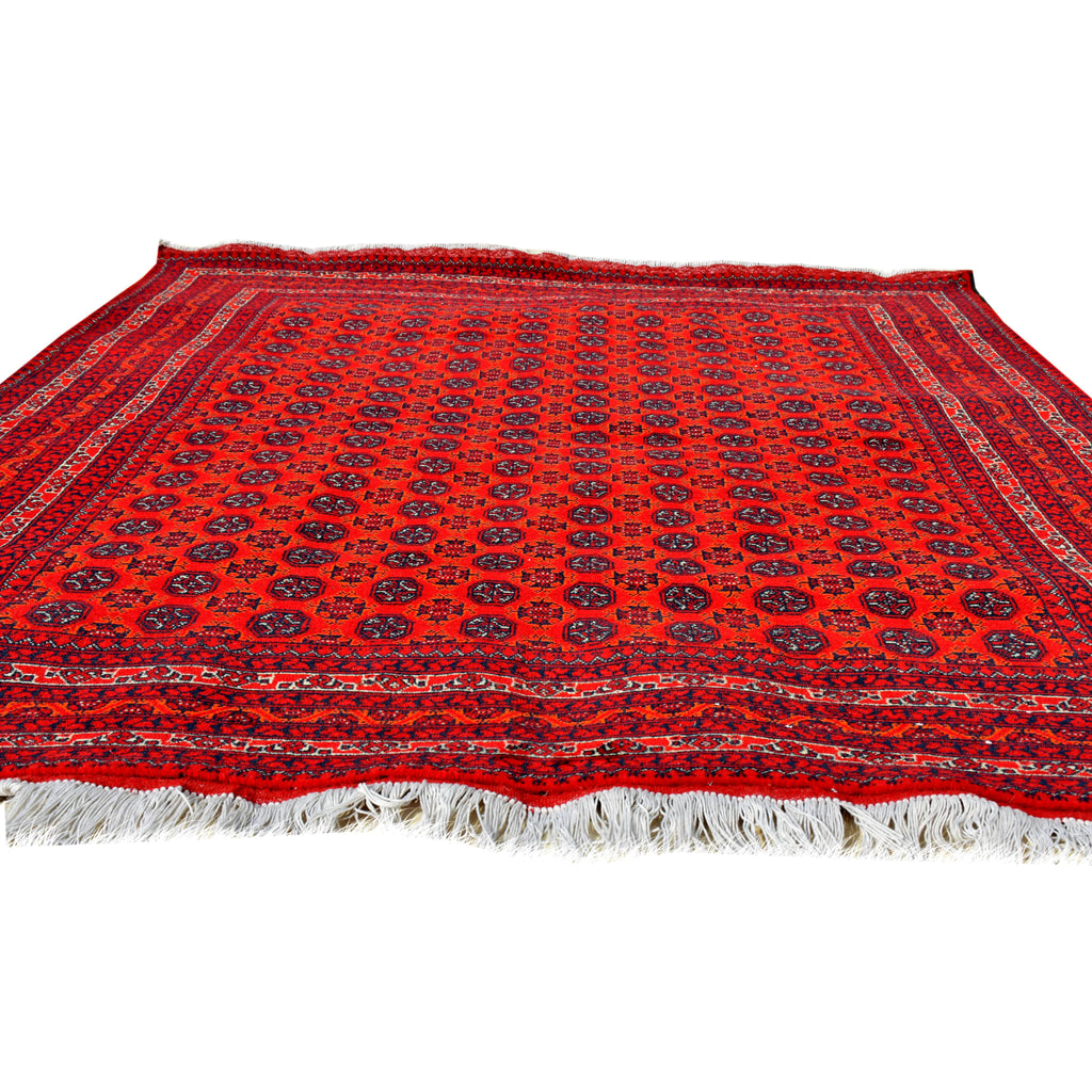 Handmade Afghan Aqcha Wool Rug 5x7 ft side angle showing madder red and charcoal black contrast