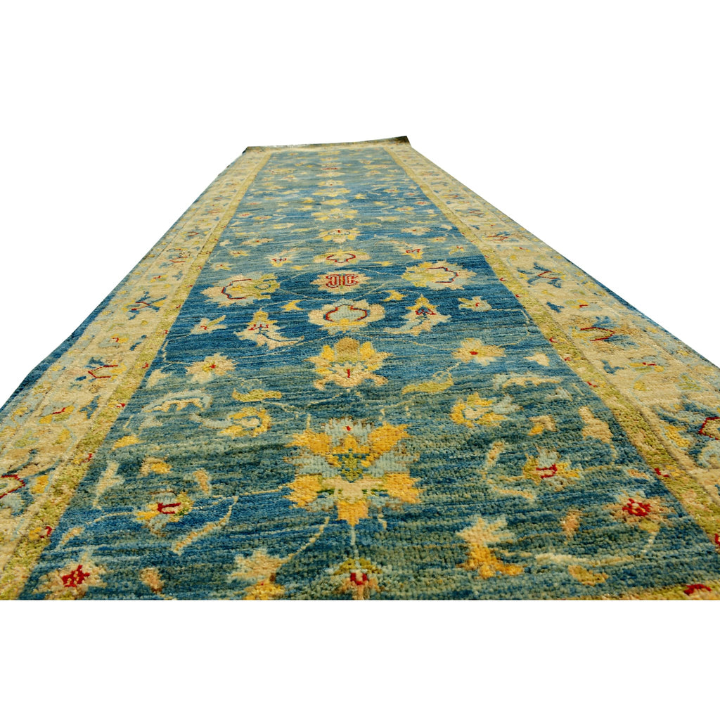 Handmade Afghan Aqcha Wool Rug 3x10 ft angled view highlighting floral pattern and color contrast