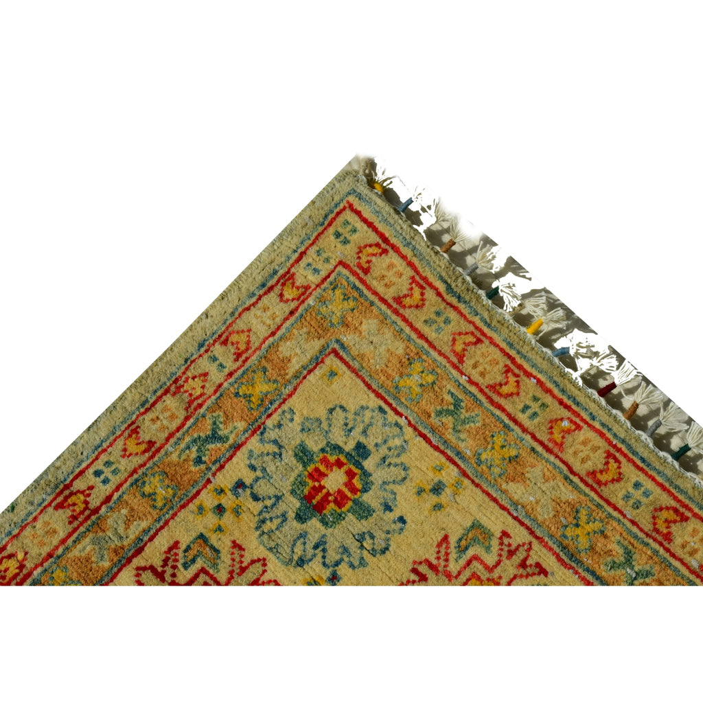 Handmade Afghan Aqcha Wool Rug 5x8 ft corner detail showing border pattern and hand tied wool fringe