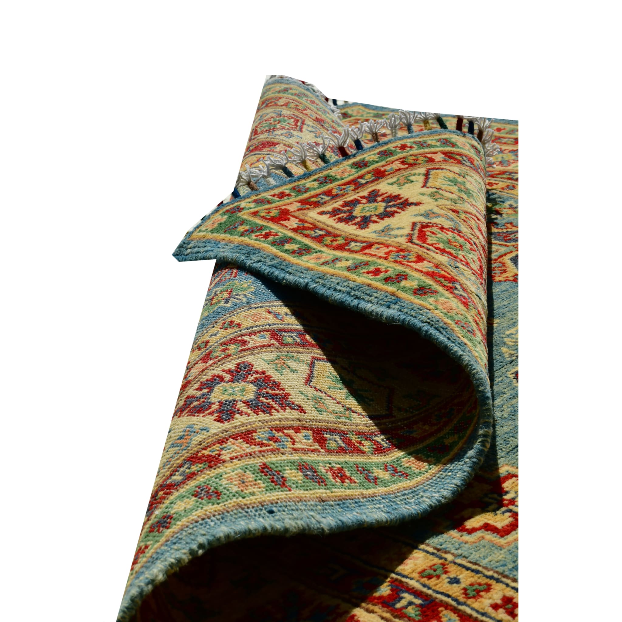 Handmade Afghan Aacha Wool Rug 4x6 ft partially rolled showing thickness and edge finish