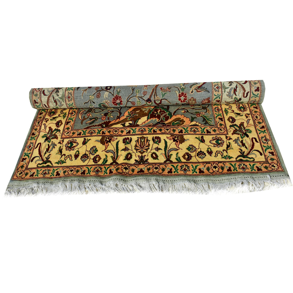 Handmade Afghan Aqcha Wool Rug 5x8 ft rolled view with visible edge and fringe